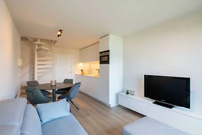 Modern appartement vlakbij zee en strand