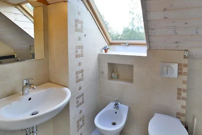 Ferienhaus am See, privater Garten, Oswino