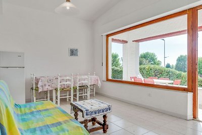 Gemütliches Ferienhaus mit Garten in Villaggi...