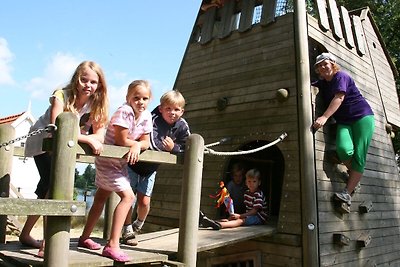 Reetgedeckte Lodge, Klimaanlage & Geschirrspü...