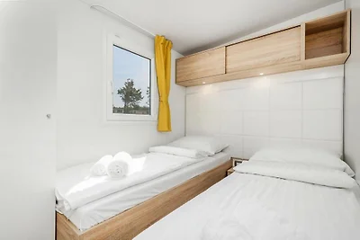 Mobilheim im Camping Omisal mit Pool