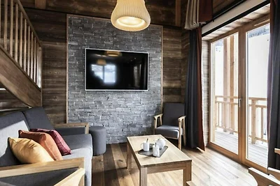 Appartement in Val Cenis met spa en zwembad