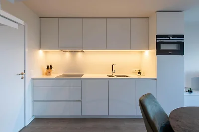 Modern appartement vlakbij zee en strand