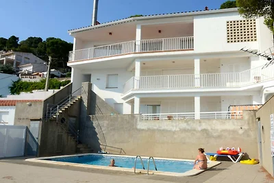 Studio bij Costa Brava Strand met Zwembad