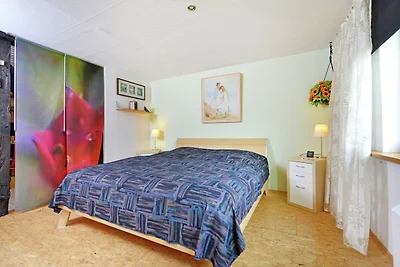 Schönes Appartement in Holz mit Terrasse