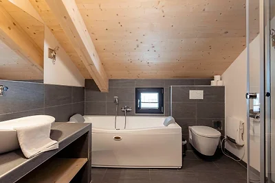 Grazioso chalet con vasca idromassaggio