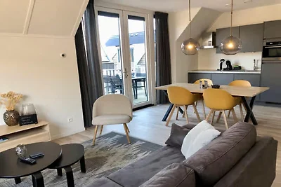 Lodge mit Blick auf die Kirche und die Dünen