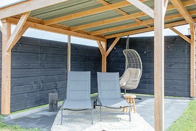 Vakantiehuis bij duinen met wellness tuin