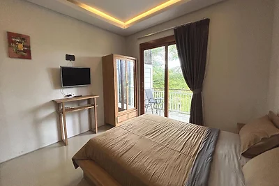 Suite con balcone vicino alla spiaggia di...