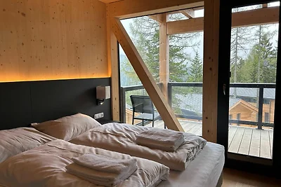 Chalet con vasca idromassaggio sul balcone