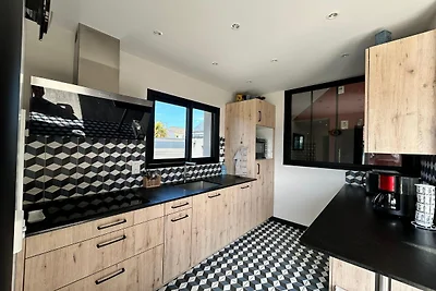 Gelijkvloers huis 200 m van het strand