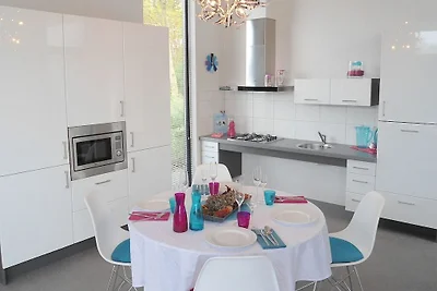 Chalet con caminetto in un villaggio vacanze