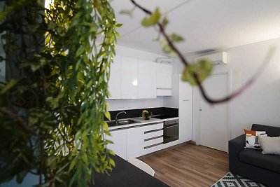 Gezellig appartement met fitnessruimte en par...