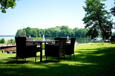 Casa sul Schwielochsee con barca privata