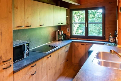 Chalet im Wald mit Whirlpool und Sauna