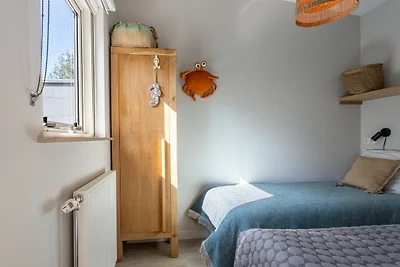 Ferienhaus am Strand mit Garten
