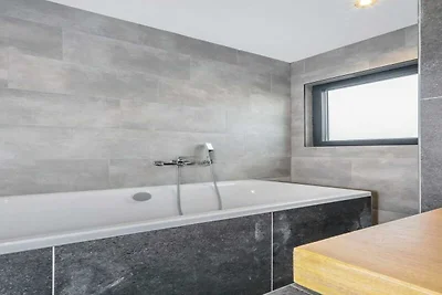 Soggiorno in lodge moderno con vista sullo...