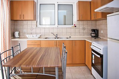 Apartment in Gennadi with a shared swimming...