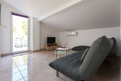 Appartamento in casa con terrazza coperta