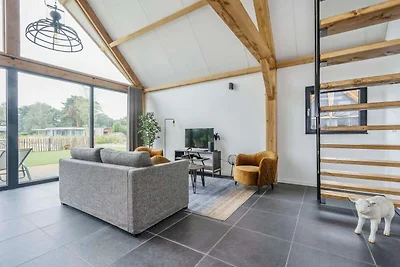 Soggiorno in lodge moderno con vista sullo...