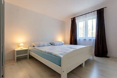 Appartamento in casa con terrazza coperta