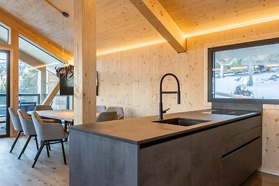 Chalet con vasca idromassaggio sul balcone