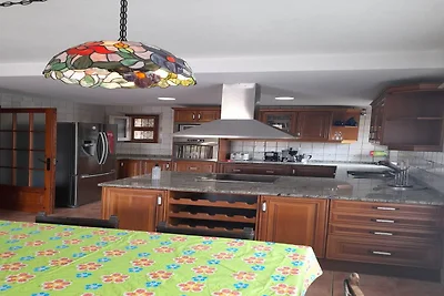 Villa mit Sonnenliegen