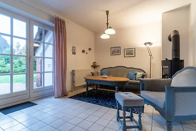 Apartment mit Kamin in einer reetgedeckten...