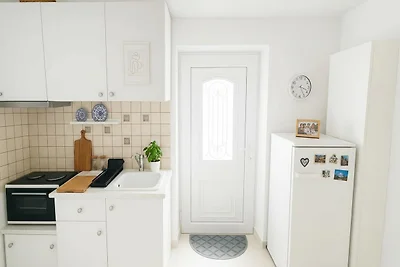 Haus in Lefkes mit Blick auf das Dorf