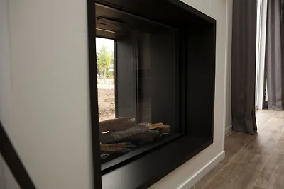 Chalet mit einem dekorativen Kamin
