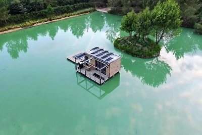 Ferienhaus an einem privaten Teich mit Blick ...