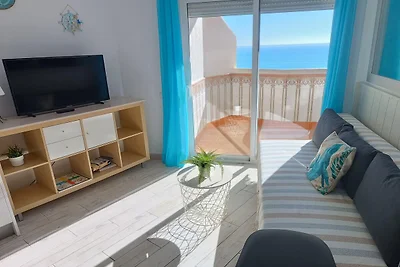 Appartement met terras en uitzicht op zee