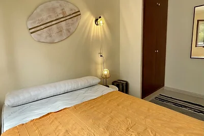 Appartamento Cala Montgo con piscina