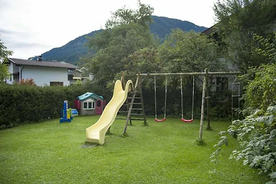 Apartment in Brixen im Thale with a garden