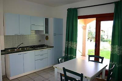 Appartement in Badesi met gedeeld zwembad
