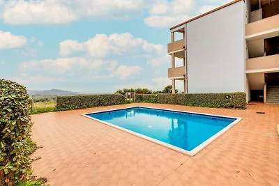 Zolder met terrazza en zwembad condivisa