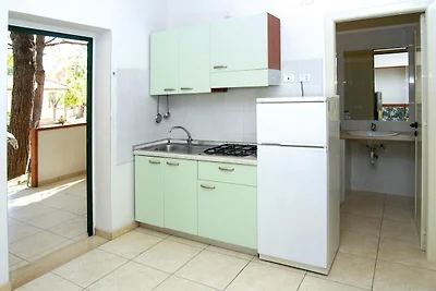 Reihenbungalow in einem Feriendorf Lido del M...