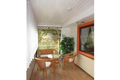 Houten vakantiehuis met wintertuin