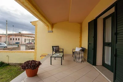 Ferienhaus in Telti mit Terrasse