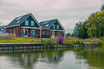 Sustainable water villa with dishwasher, by a...