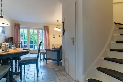 Apartment mit Kamin in einer reetgedeckten...