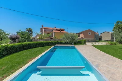 Holiday home in Tinjan with swimming pool