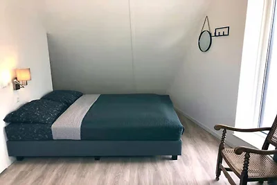 Lodge mit Blick auf die Kirche und die Dünen