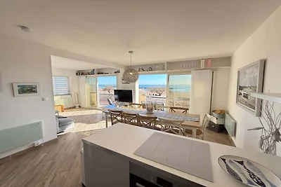 Appartement aan het strand met balkon