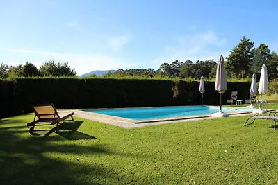 Grazioso cottage a Santa Comba con piscina