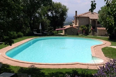 Attraente casa vacanze con piscina in comune
