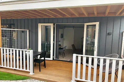 Lodge im Erdgeschoss mit privater Veranda