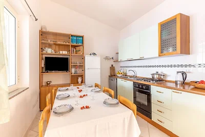 Wohnung in Calagonone mit Garten