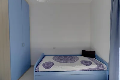 Meerblick mit Klimaanlage und Garten