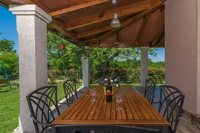 Holiday home in Tinjan with swimming pool
